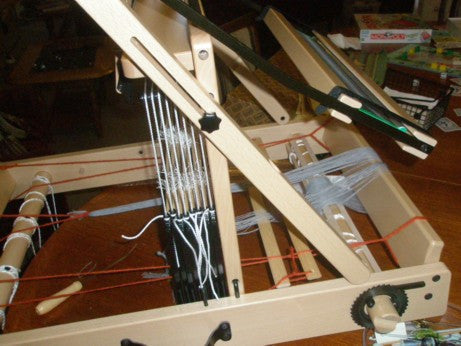 photo shows beater moved to the back of loom allowing  easy threading of the heddles